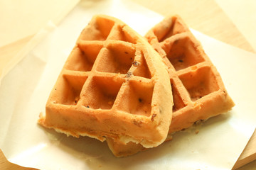 Home made Belgium waffle on paper.