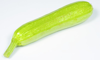 Fresh zucchini on white