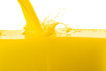 orange juice splashing against white background - obrazy, fototapety, plakaty