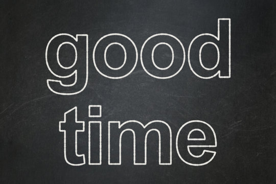 Time concept: text Good Time on Black chalkboard background