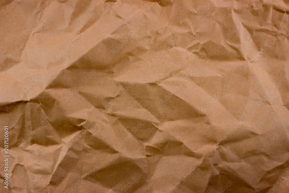 Poster crumpled brown torn paper background. empty space for text and design. template for banner and messa