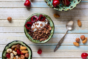 Chocolate granola cherry and nuts, healthy breakfast