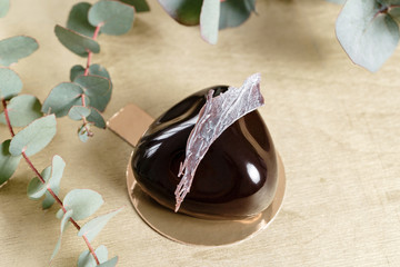 Delicious chocolates cakes. Glossy glaze and chocolate decor. Different forms. dessert pie for sale at the shop.