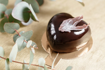 Delicious chocolates cakes. Glossy glaze and chocolate decor. Different forms. dessert pie for sale at the shop.