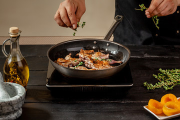 Chef cook the quail into the frying pan