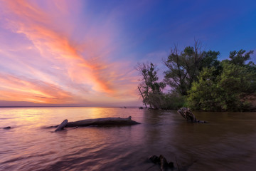 Fototapeta na wymiar beautiful sunrise on the river Bank / early spring Ukraine Dnipro river
