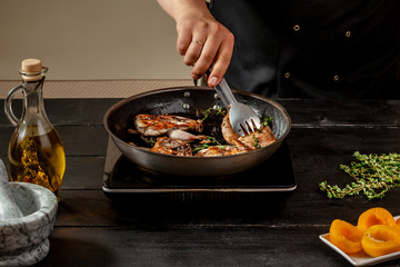 Chef cook the quail into the frying pan