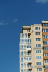 Multi-storey house and blue sky