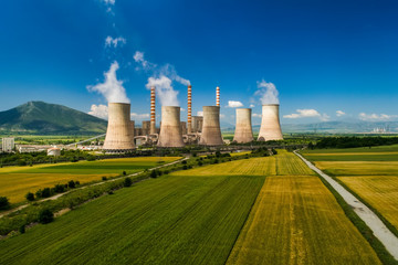 Aerial view the plant producing electrical energy with large pipes at Kozani in northern Greece.