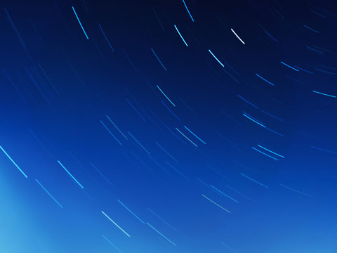 Star tracks on clear night sky. Moscow region, Russia. Long exposure.