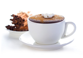 Hot chocolate close-up on a white background.