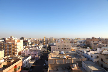Fototapeta premium Sunset scene with buildings silhouette in countryside of Jeddah, Saudi arabia