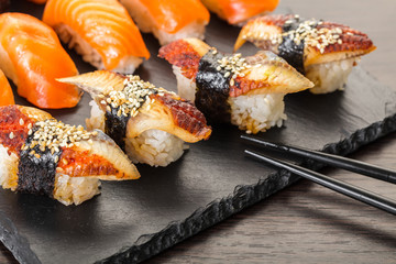 japanese cuisine, sushi set on a board