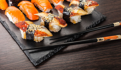 japanese cuisine, sushi set on a board