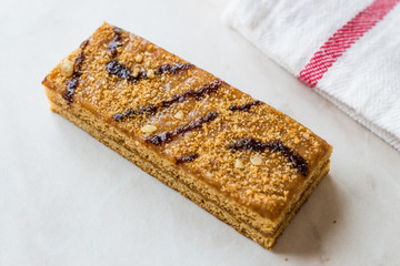 Honey Flavored Energy Bar with Walnut, Milk and Caramel Sauce