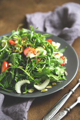 Green salad, arugula, cherry tomatoes, celery