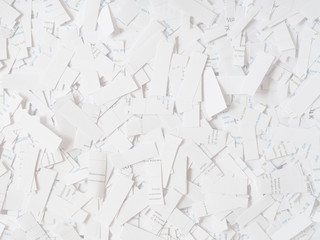 Cut paper background, toned image. Rectangular pieces of white paper with the text shredded background. Documents shredder