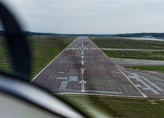 Approach to the runway of Braunschweig Airport from the pulpit of a two-seater small aircraft