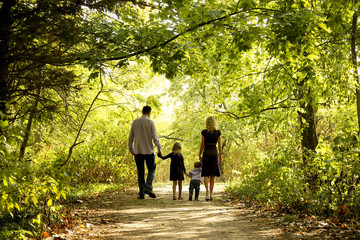 happy young family in nature