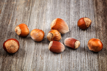 Hazelnut on a wooden background. Healthy food