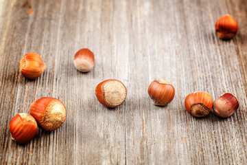 Hazelnut on a wooden background. Healthy food