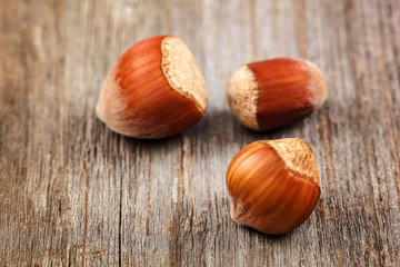 Hazelnut on a wooden background. Healthy food