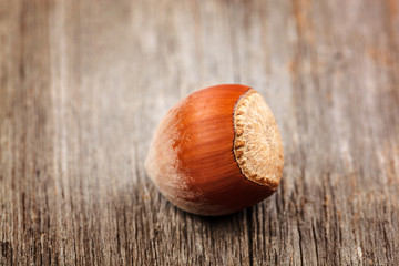 Hazelnut on a wooden background. Healthy food