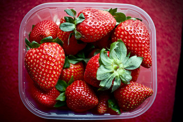 Strawberries in plastic basket