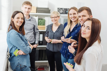 Confident successful young business team