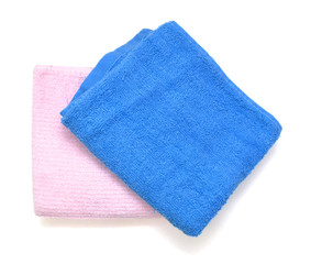 colorful stacked bathroom towels on a white background