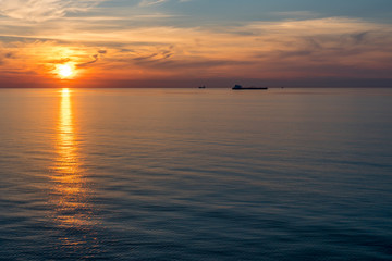 big transporter ship during sunset