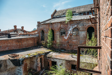 Ruined and abandoned factory, industrial background, destruction and debris