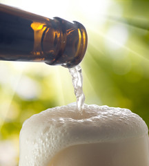 image of beer with foam closeup