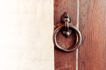 wooden door gate with a forged handle ring