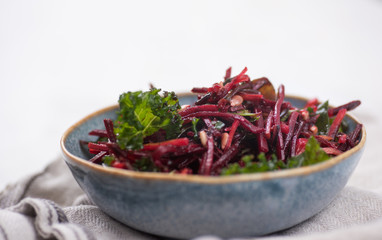 Beet and Carrot Salad with Kale and Sprouts