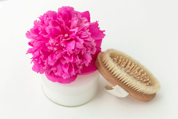 Body care, fight with cellulite, dry massage. Brush for massage, peony, cream.