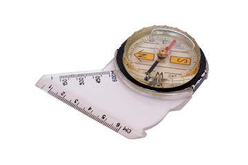 Old tourist compass with measuring scale isolated on white background