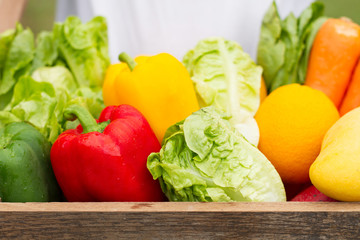 Fresh organic vegetable in wooden crate just harvest from farm. Concept grocery, fresh product, healthy eating, diet and food for cardiologist.