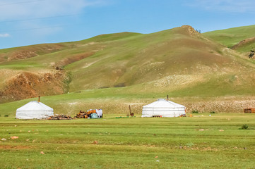Mongolian yurts called gers on steppe in Khovsgol Province, northern Mongolia - Powered by Adobe