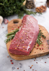 Beef Tenderloin on Wooden cutting Board