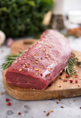 Beef Tenderloin on Wooden cutting Board