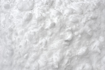 Snowy white fresh winter background after snowfall