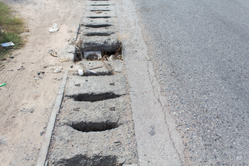 Damaged road with holes, Puddle on asphalt road