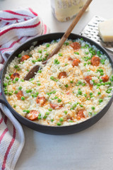 Rice risotto with chorizo and pea
