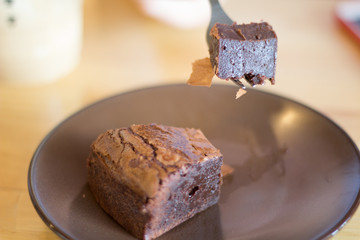 Abstract dessert Chocolate on the wooden table. selective focus blurred in the other.
