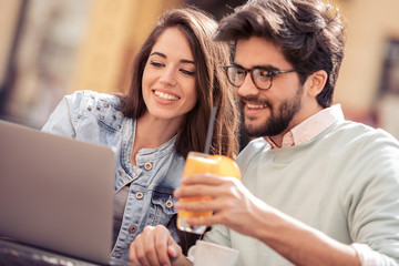 Attractive young couple on a dating in cafe