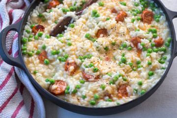 Rice risotto with chorizo and pea