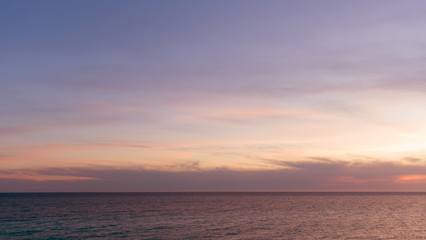 Fototapeta na wymiar Majestic sunset over calm water.