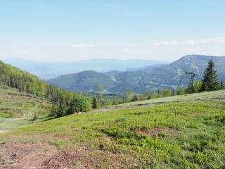 Naklejka premium Scenic view from Klimczok mount in Silesian Beskids Mountains range landscape near european Bielsko-Biala city in Poland