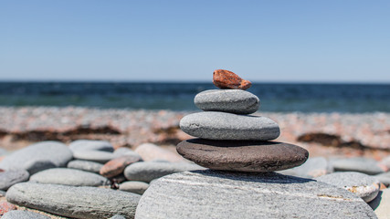 Fototapeta na wymiar Stacked beach stones